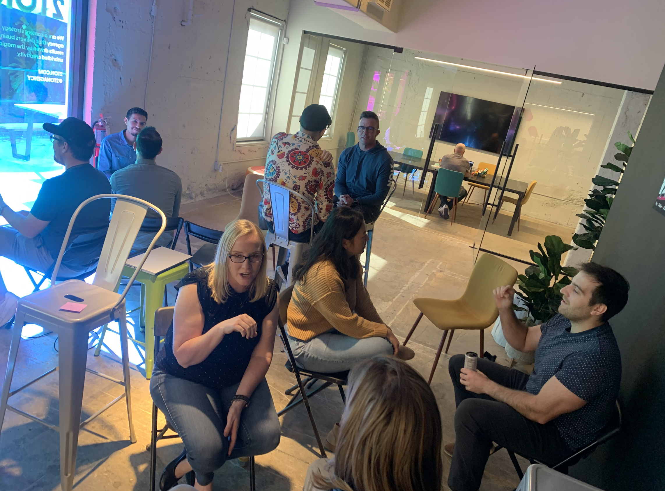 Team engaged in honest conversation during a culture session